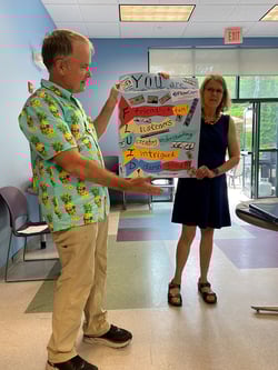Chris & Margot with poster